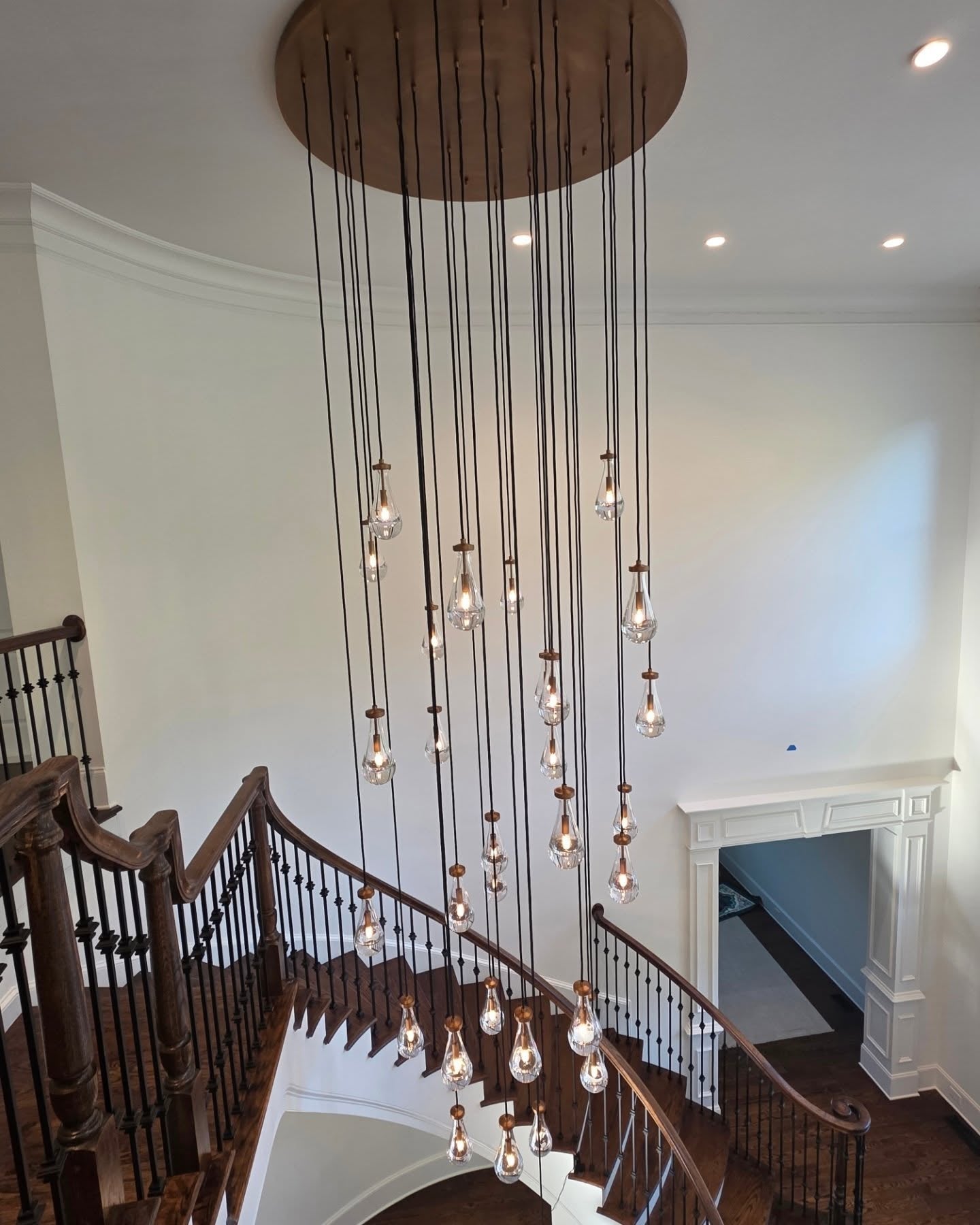 How Big Should a Staircase Chandelier Be? Size, Drop Length &amp; Placement Guide