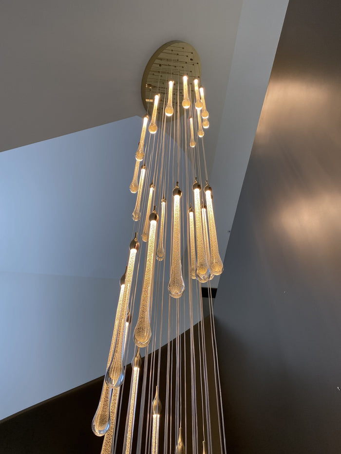 Custom Staircase Chandelier Project: Rain-Like Glass Lighting for a Spiral Staircase
