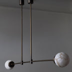 Brass and Alabaster Globes Asymmetrical Line Chandelier