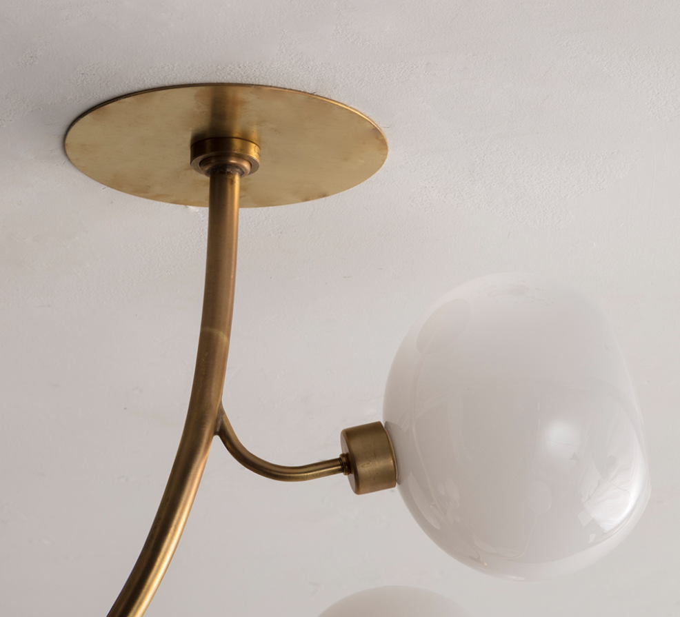 Modern Brass Branch Chandelier with Glass Globes material and finish detail