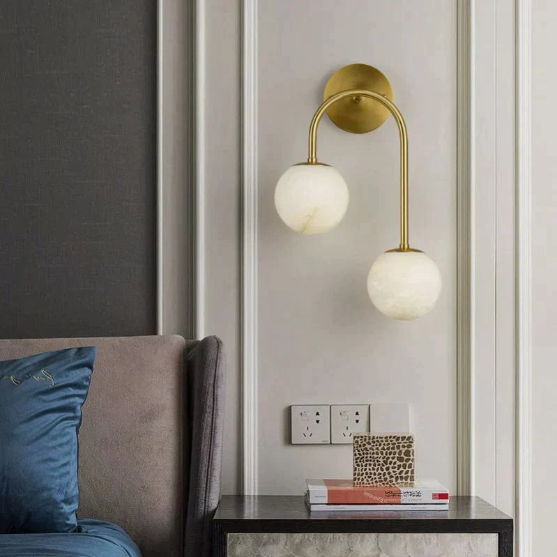 Alabaster Globe Modern Wall Sconce In Bedroom by Bling Lighting Studio
