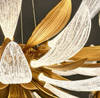 Dandelion lighting close-up of clear glass petals and brass details