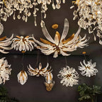 Dandelion mixed chandelier pendant and wall lighting installation in a showroom