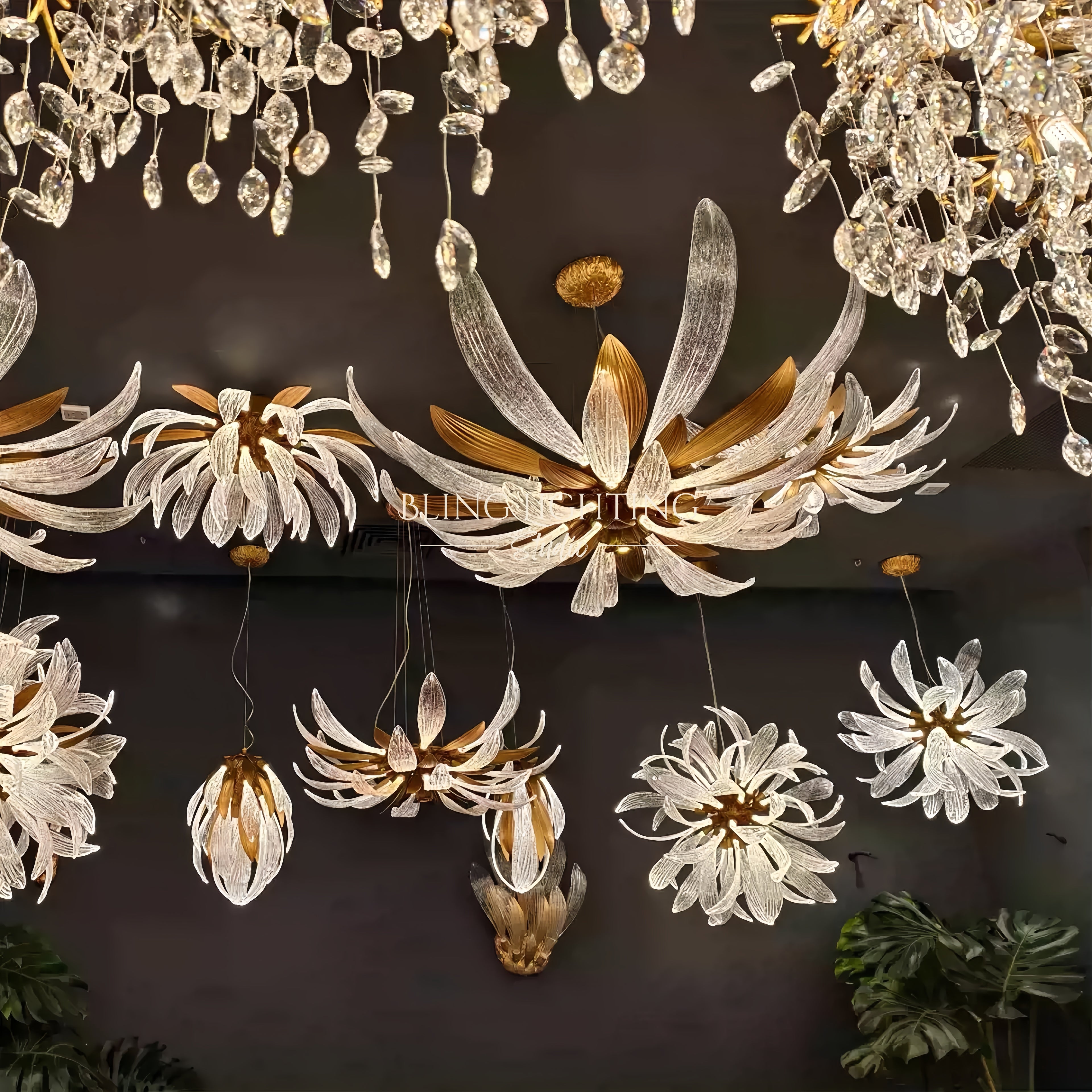 Dandelion mixed chandelier pendant and wall lighting installation in a showroom