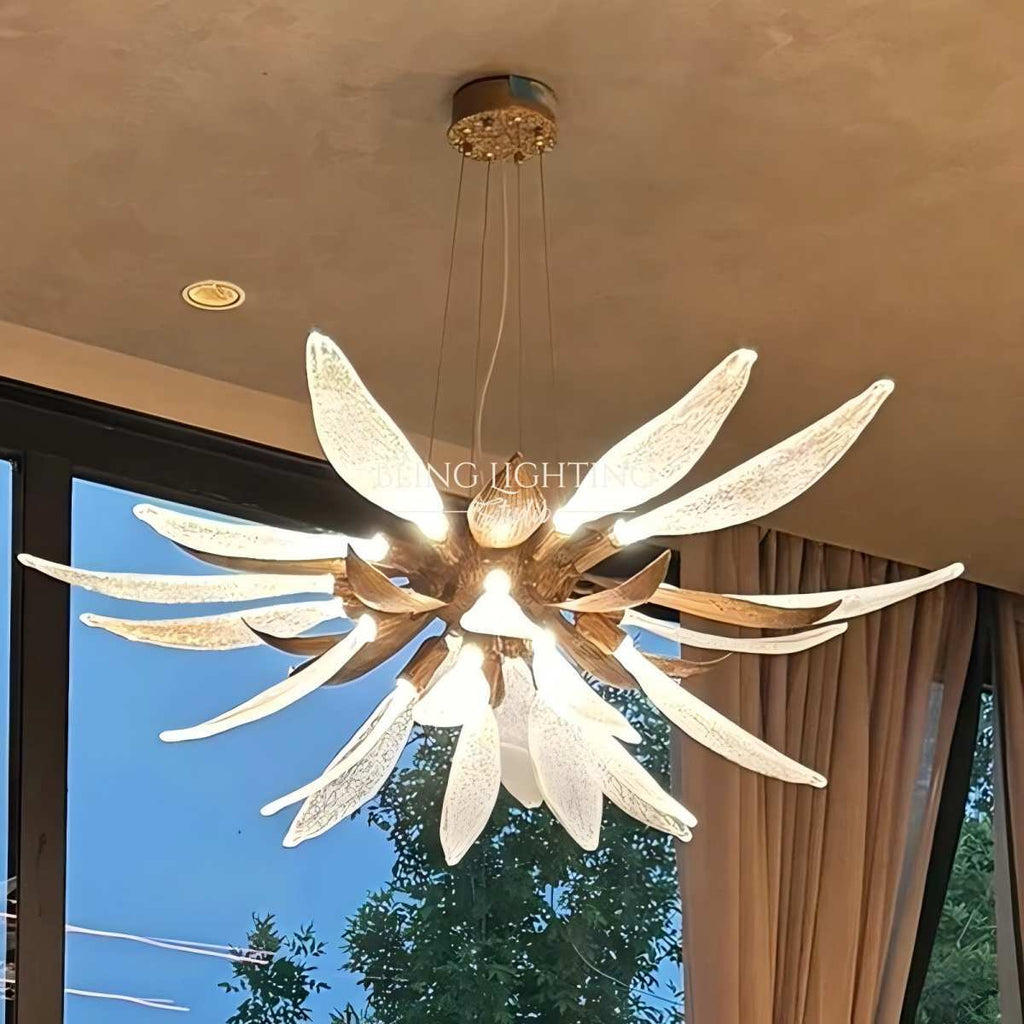 Dandelion glass pendant light installed near a window